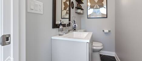 Hair dryer, towels, soap, shampoo