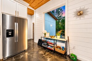 Kitchen: Sleek stainless steel meets nature, perfect for culinary adventures and scenic views! - 1-Story Stay | Hot Tub, PingPong, Arcade & Playset (Broken Bow)