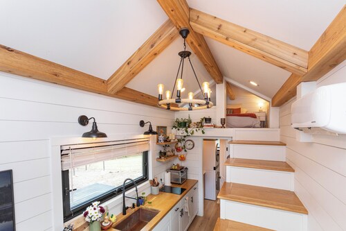 Nestled in the mountains, this cozy tiny home is 15 minutes to Asheville.