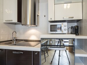 Fridge, microwave, cookware/dishes/utensils