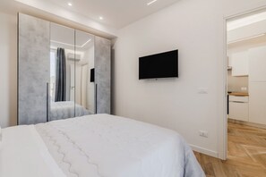 1 habitación, tabla de planchar con plancha, wifi y ropa de cama 