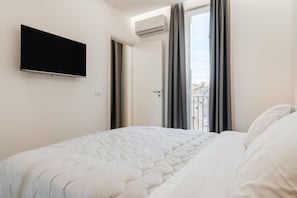 1 habitación, tabla de planchar con plancha, wifi y ropa de cama 
