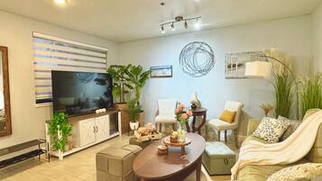 Deluxe House, 3 Bedrooms, Kitchen | Living area | Flat-screen TV