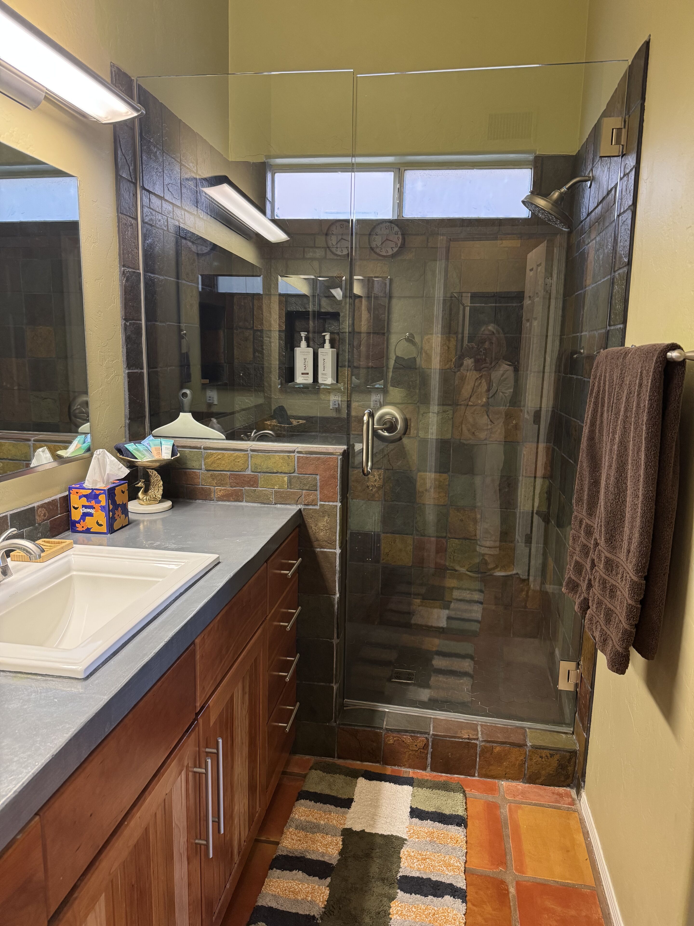 Shower, towels, soap, toilet paper