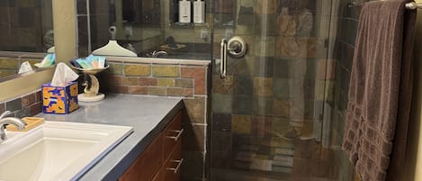 Shower, towels, soap, toilet paper