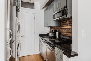 Fridge, microwave, oven, stovetop - Blueground | West Village, AC, w/d, nr park (New York)