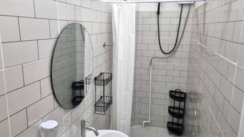 Comfort Townhome, Kitchenette, City View | Bathroom | Free toiletries, slippers, towels, soap