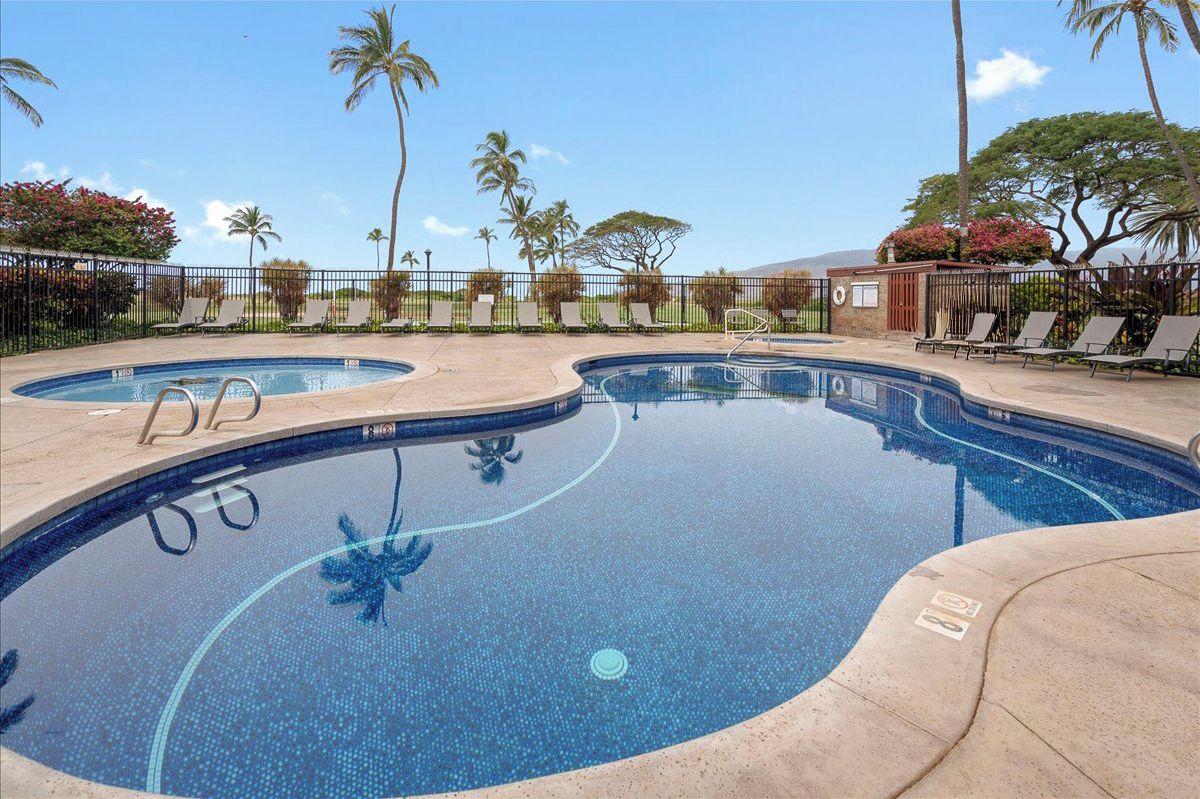 Spend your afternoons lounging by the sparkling community pool. Surrounded by swaying palms and lush landscapes, it is a peaceful oasis to soak up the sun or enjoy a refreshing dip.
