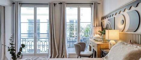 1 slaapkamer, een strijkplank/strijkijzer, wifi, beddengoed