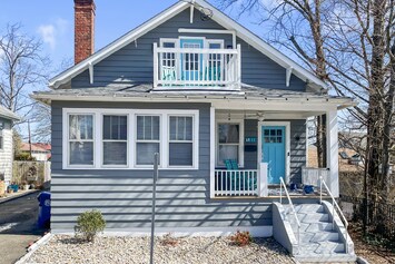 Classic Cape Charm. Timeless, coastal-style exterior. It’s a picture-perfect place to start your beach getaway, just steps away from the shoreline!