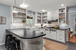 Fridge, microwave, stovetop, coffee/tea maker