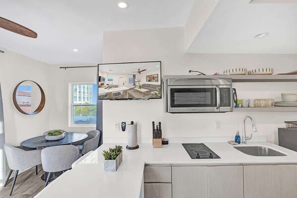 Microwave, stovetop, coffee/tea maker, electric kettle
