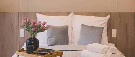 Een strijkplank/strijkijzer, gratis wifi, beddengoed