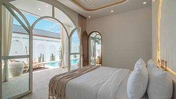 Luxury Villa, Patio, Pool View | 2 bedrooms, in-room safe, desk, iron/ironing board