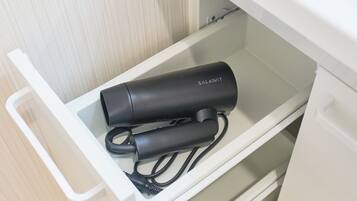 Apartment, Non Smoking (1F) | Bathroom | Combined shower/tub, hair dryer, slippers, bidet