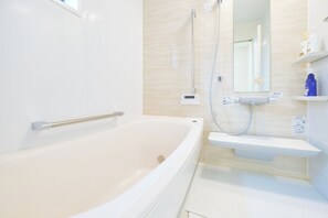 Apartment, Non Smoking (1F) | Bathroom | Combined shower/bathtub, hair dryer, slippers, towels - Sunny Court by Tranova (Tokyo)