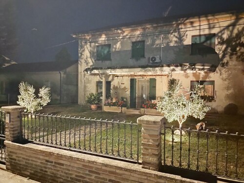 Halfway between Ferrara and Ravenna, a step away from the Comacchio valleys.