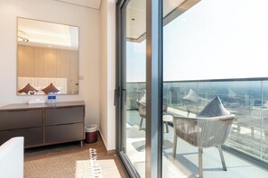 Enjoy a city view from the balcony through the large sliding glass door.