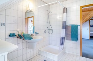 Shower, hair dryer, towels