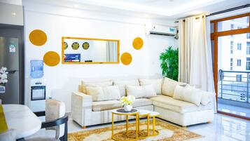 Comfort Apartment | Living area | 32-inch Smart TV with digital channels