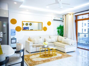 Comfort Apartment | Living area | 32-inch Smart TV with digital channels
