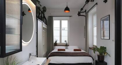 Loft apartment in industrial design, 43 mÂČ, high-quality furnishings, close to the train station
