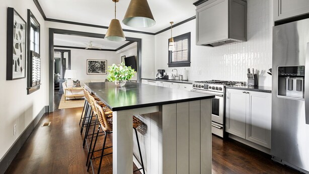 A modern kitchen with a central island, stainless steel appliances, and pendant lighting. - The Preserve | Barbados Lock-off | 3 BR + 3 BA (Charleston)