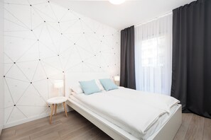Apartamento Confort, vistas al patio | 1 dormitorio y espacio para trabajar con un portátil