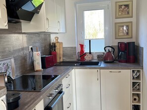 Réfrigérateur, four, plaque de cuisson, lave-vaisselle