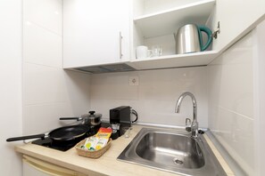 Fridge, microwave, coffee/tea maker, electric kettle