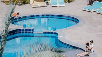 Outdoor pool, open 8:00 AM to 7:00 PM, pool umbrellas, sun loungers