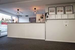 Check-in/check-out kiosk