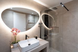 Shower, hair dryer, soap, shampoo