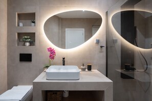 Shower, hair dryer, soap, shampoo