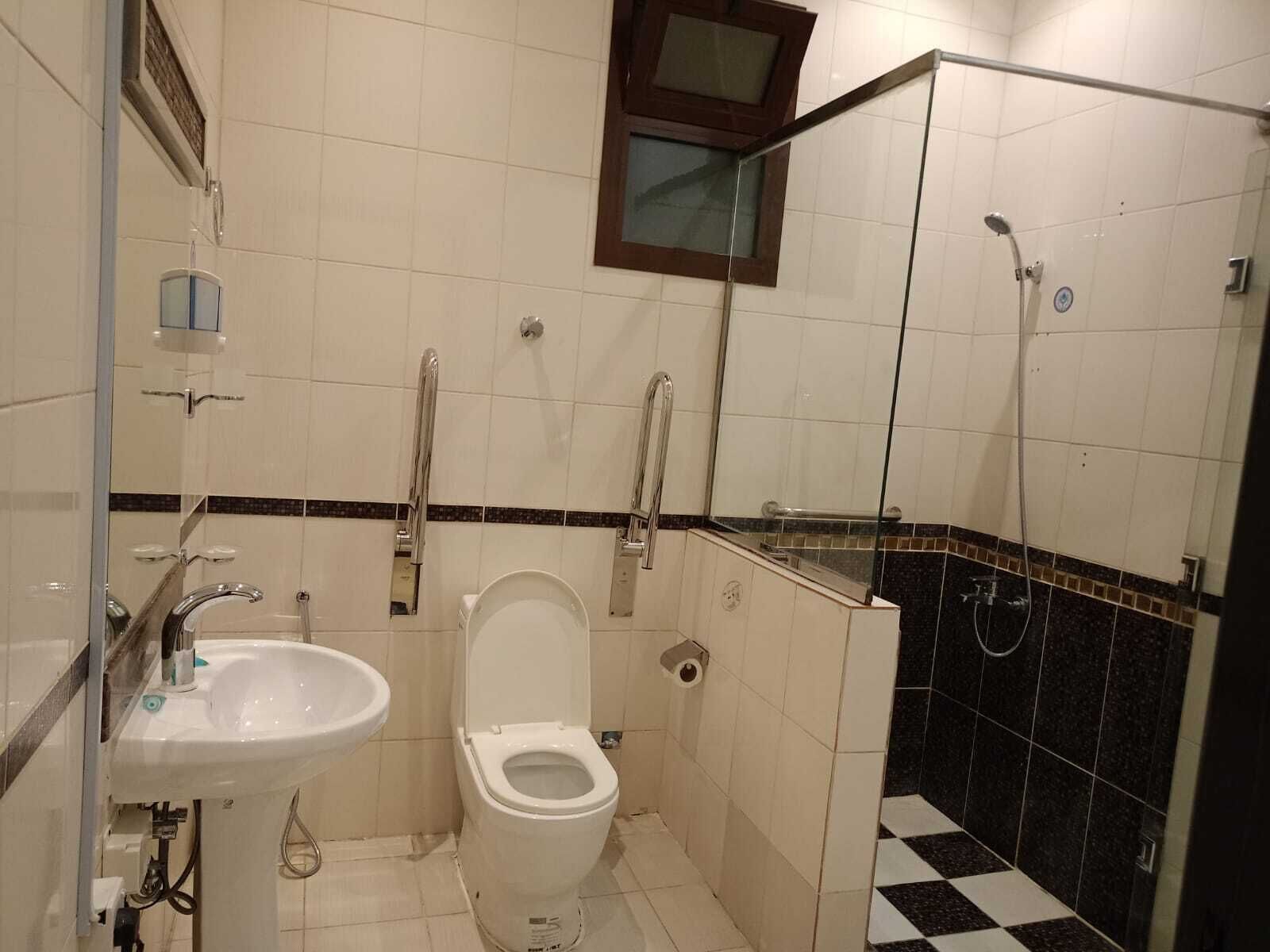 Room | Bathroom | Shower, hair dryer, slippers, towels