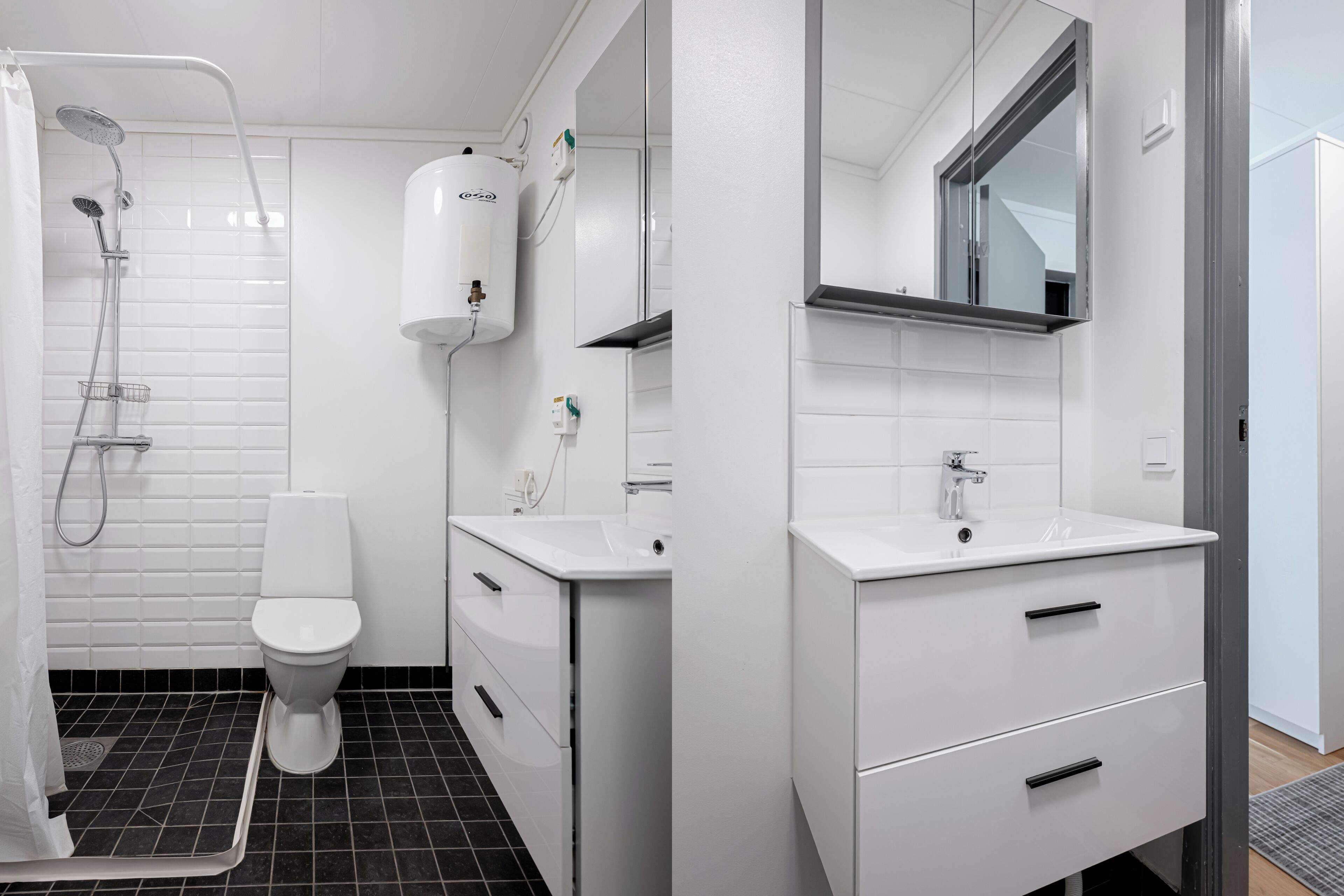 A modern bathroom with a shower, toilet, and white cabinetry.