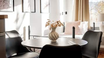 Classic Triple Room, City View | Living area | 32-inch LCD TV with cable channels
