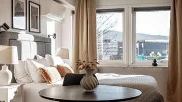 Classic Double Room | Living area | 32-inch LCD TV with cable channels
