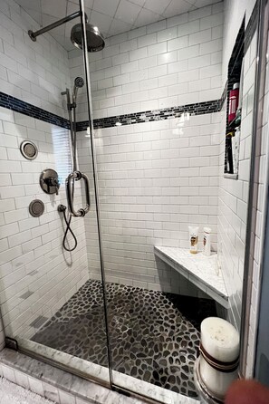 Shower, hair dryer, towels, soap