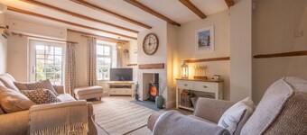 A delightful mid-terrace Victorian cottage only a short drive from the coast!