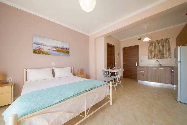 Bright and Breezy Bedroom with Double Bed and Warm Lighting – A Relaxing Nest