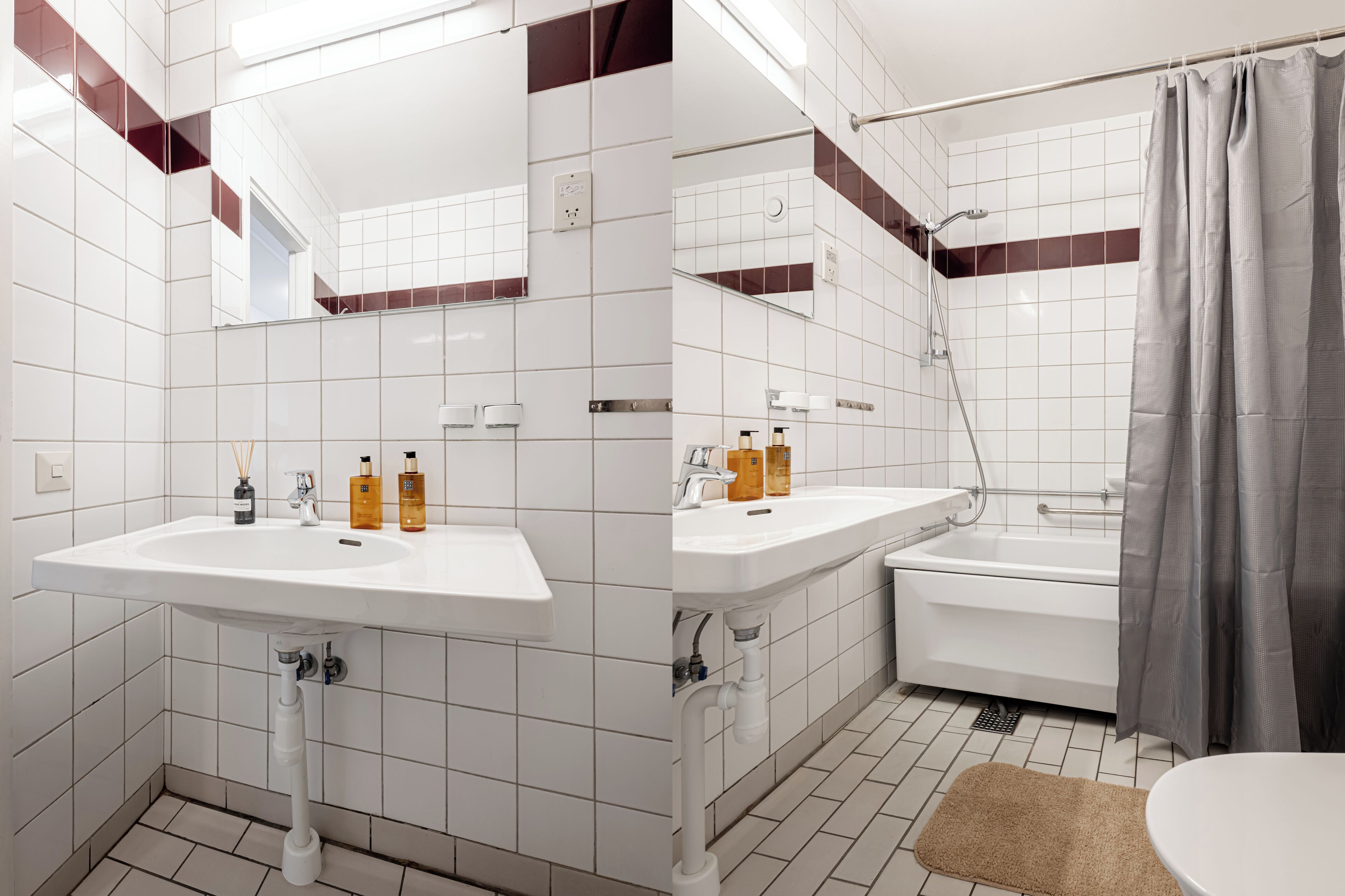 A modern bathroom with two sinks, a bathtub, and a shower curtain.