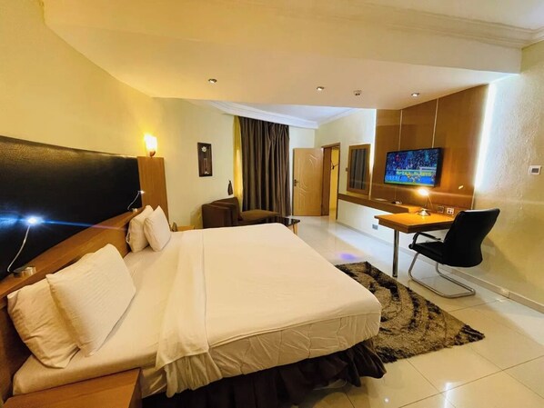 Economy Room, Balcony, City View | Desk, laptop workspace, blackout drapes, soundproofing