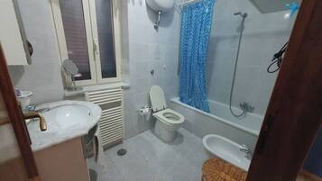 Hair dryer, bidet, towels, soap