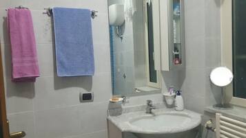 Hair dryer, bidet, towels, soap