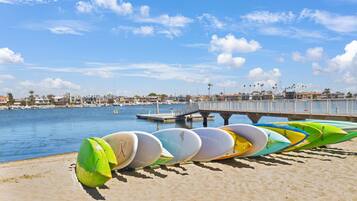 On the beach, sun loungers, beach towels