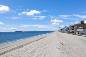 On the beach, sun loungers, beach towels