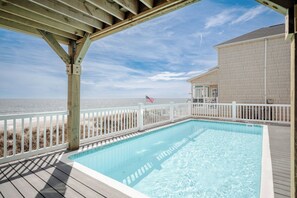 A heated pool - Seaside Delight: Luxury Oceanfront Home with Pool, Elevator (Oak Island)