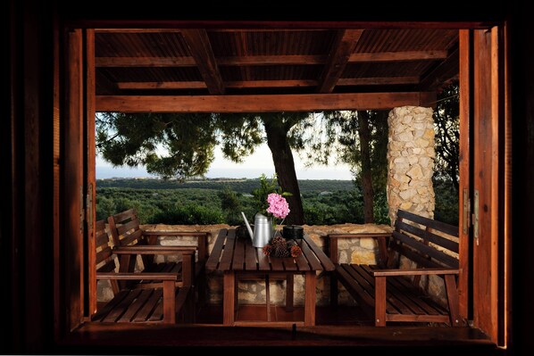 Outdoor dining - Cozy 1-bedroom apartment overlooking the Ionian sea. (Tragana)