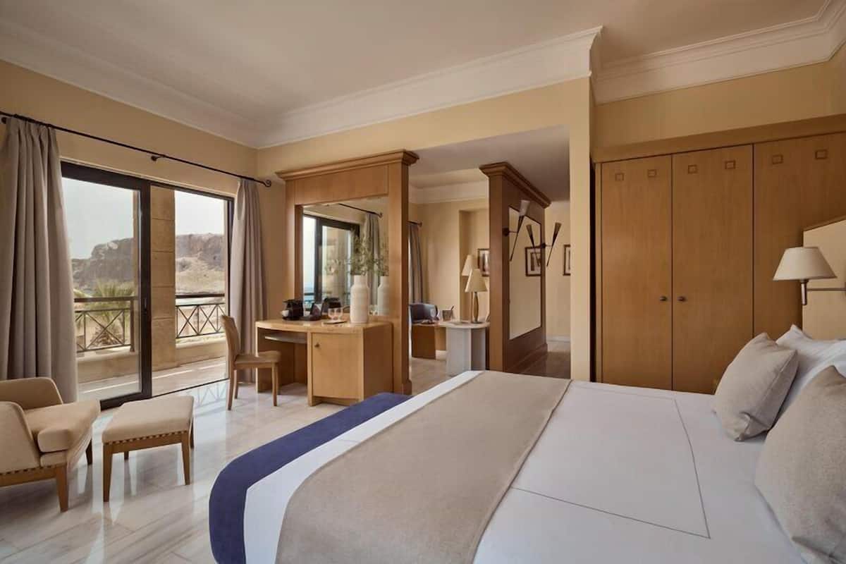 In-room safe, laptop workspace, blackout drapes, soundproofing